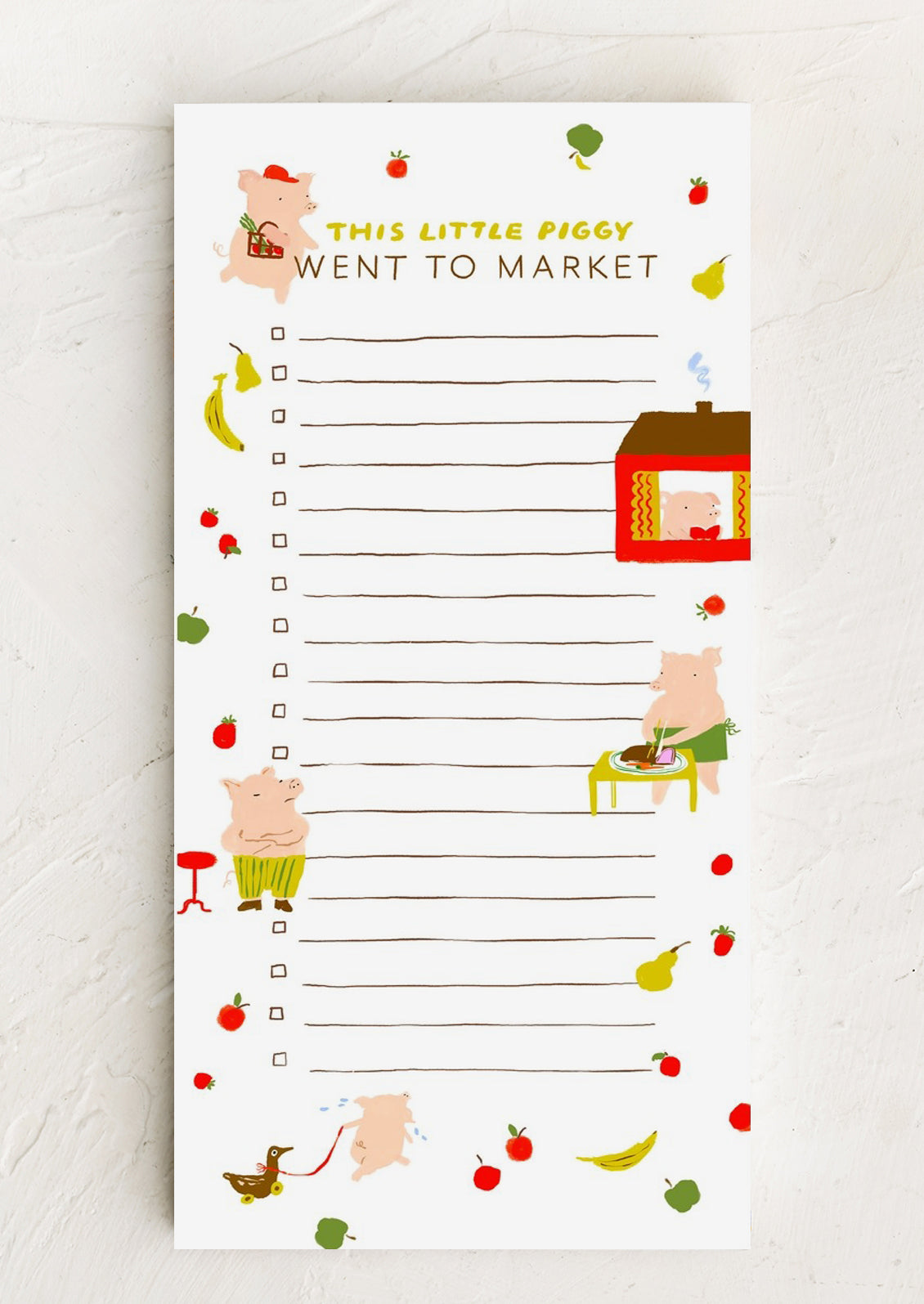 Notepad with illustrations of pigs and vegetables on a white background