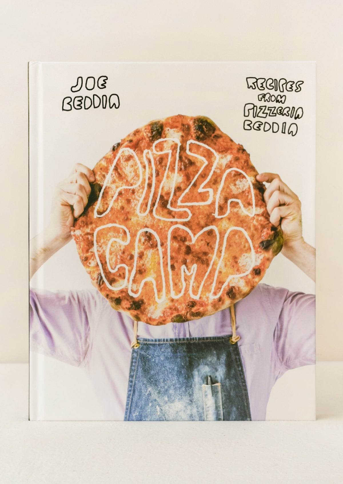 A book titled "Pizza Camp" by Joe Beddia.