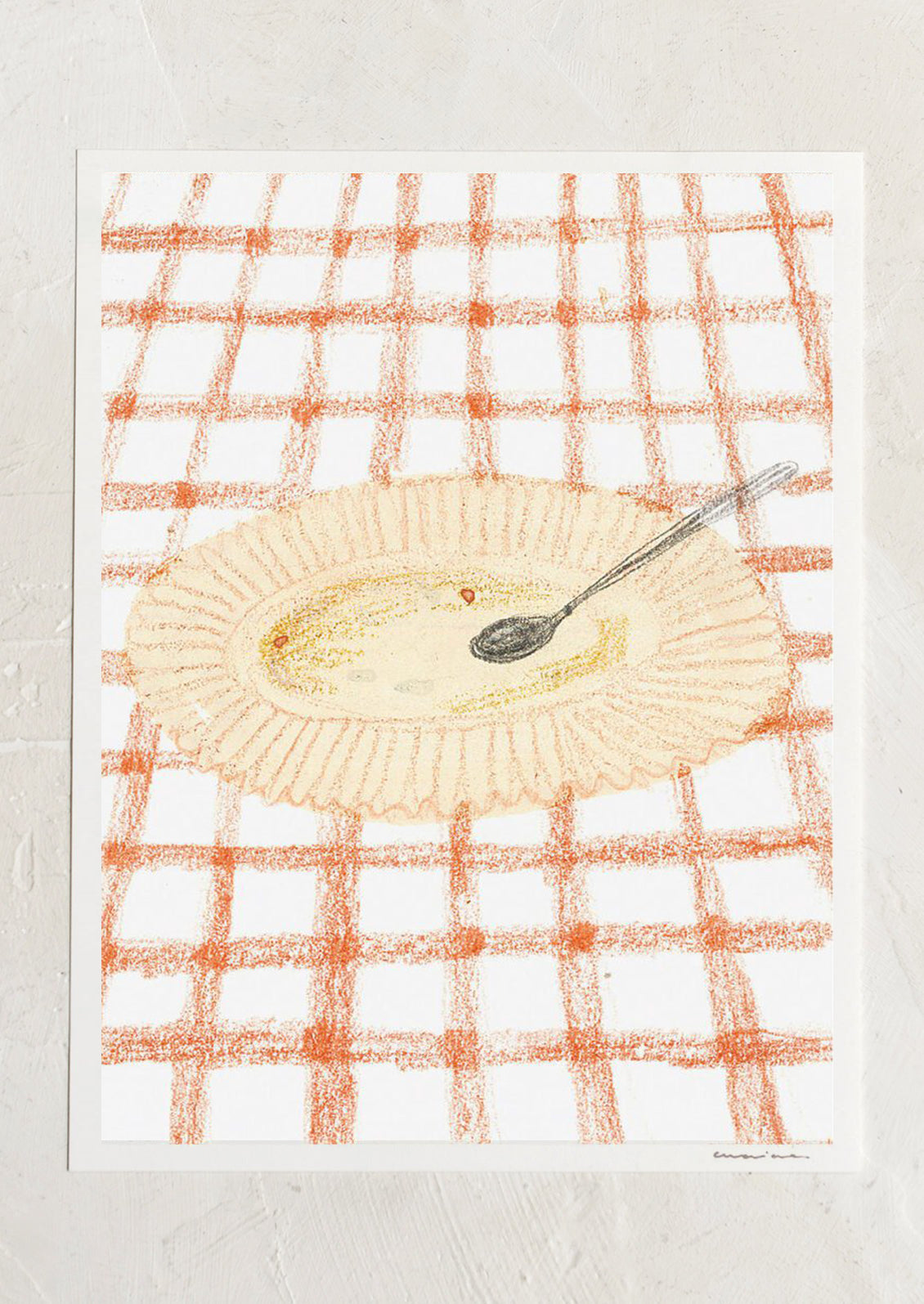 An art print of a drawing of a yellow plate on an orange and white checkered surface.