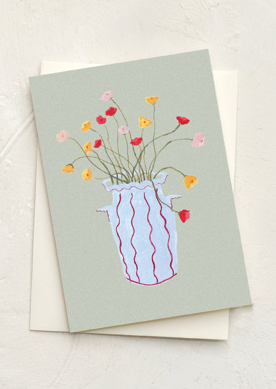 A mini greeting card in sage green with illustration of poppies in vase.