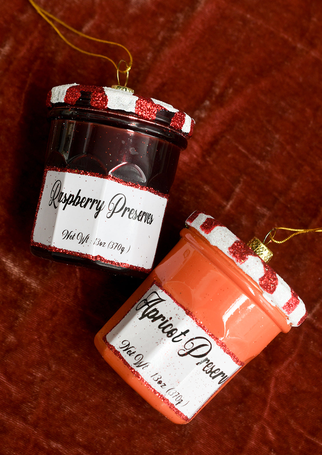 Glass ornaments resembling Bonne Maman jam jars.