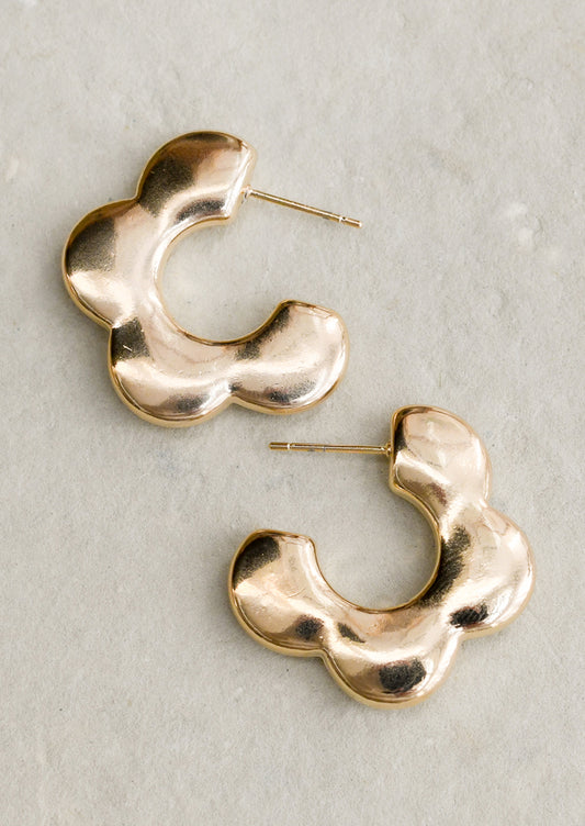 A pair of post back earrings with 3/4 flower shape with puffy look.