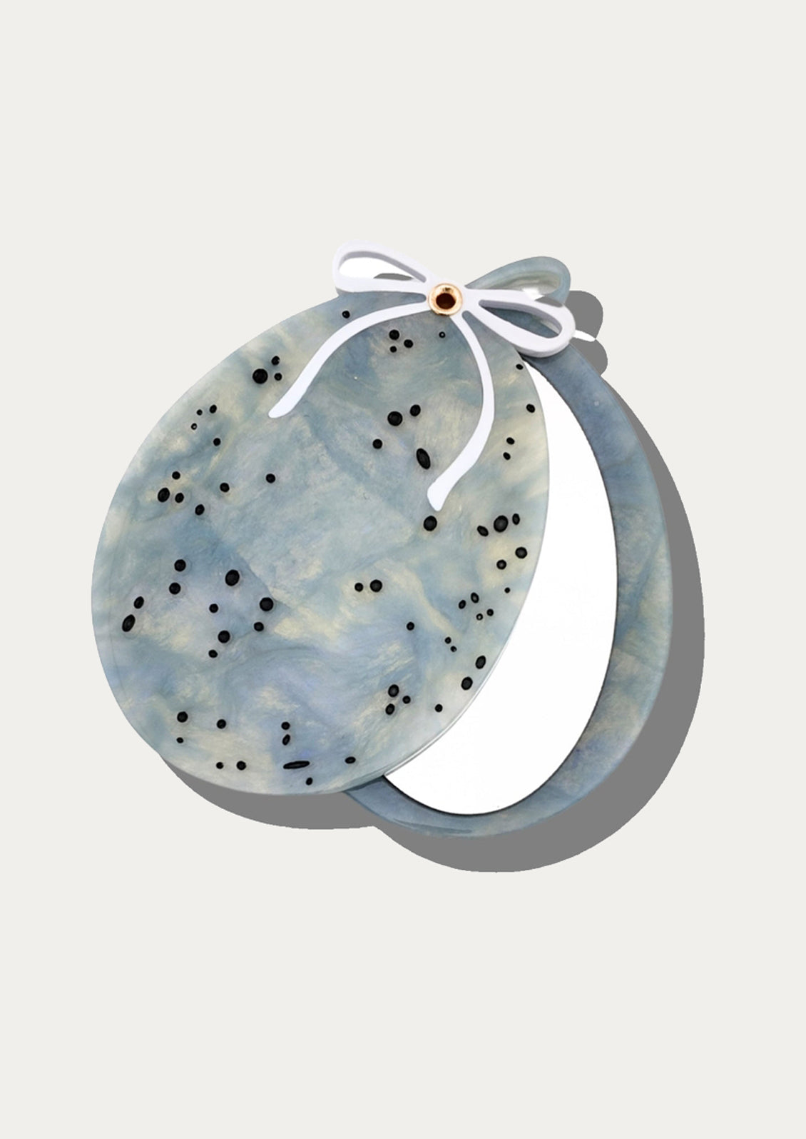 Robin's egg shaped compact mirror.