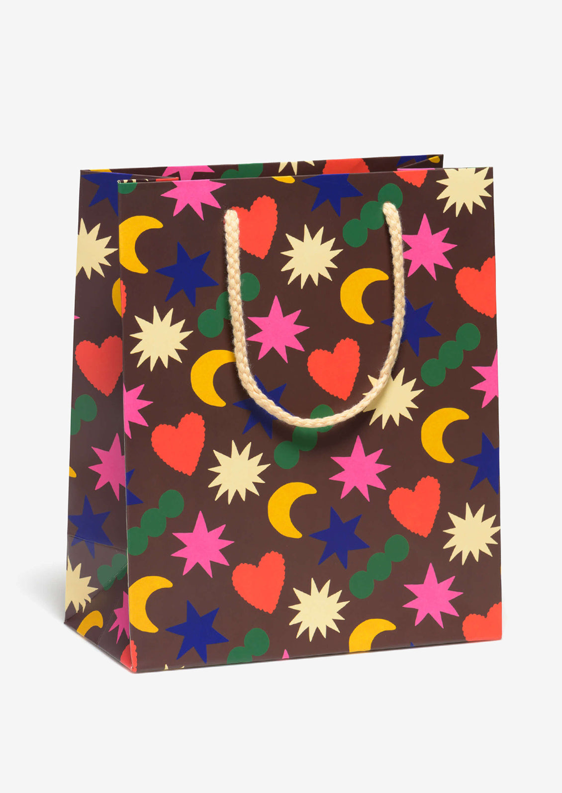 A printed gift bag with multicolor charm shapes print on brown background.