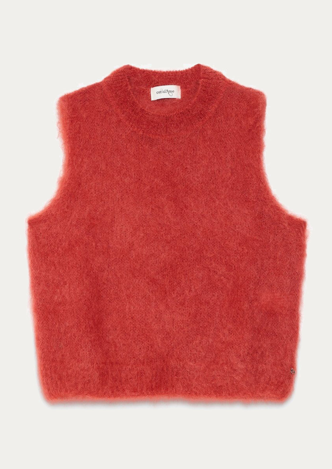 A super fuzzy sweater vest in vibrant raspberry color.
