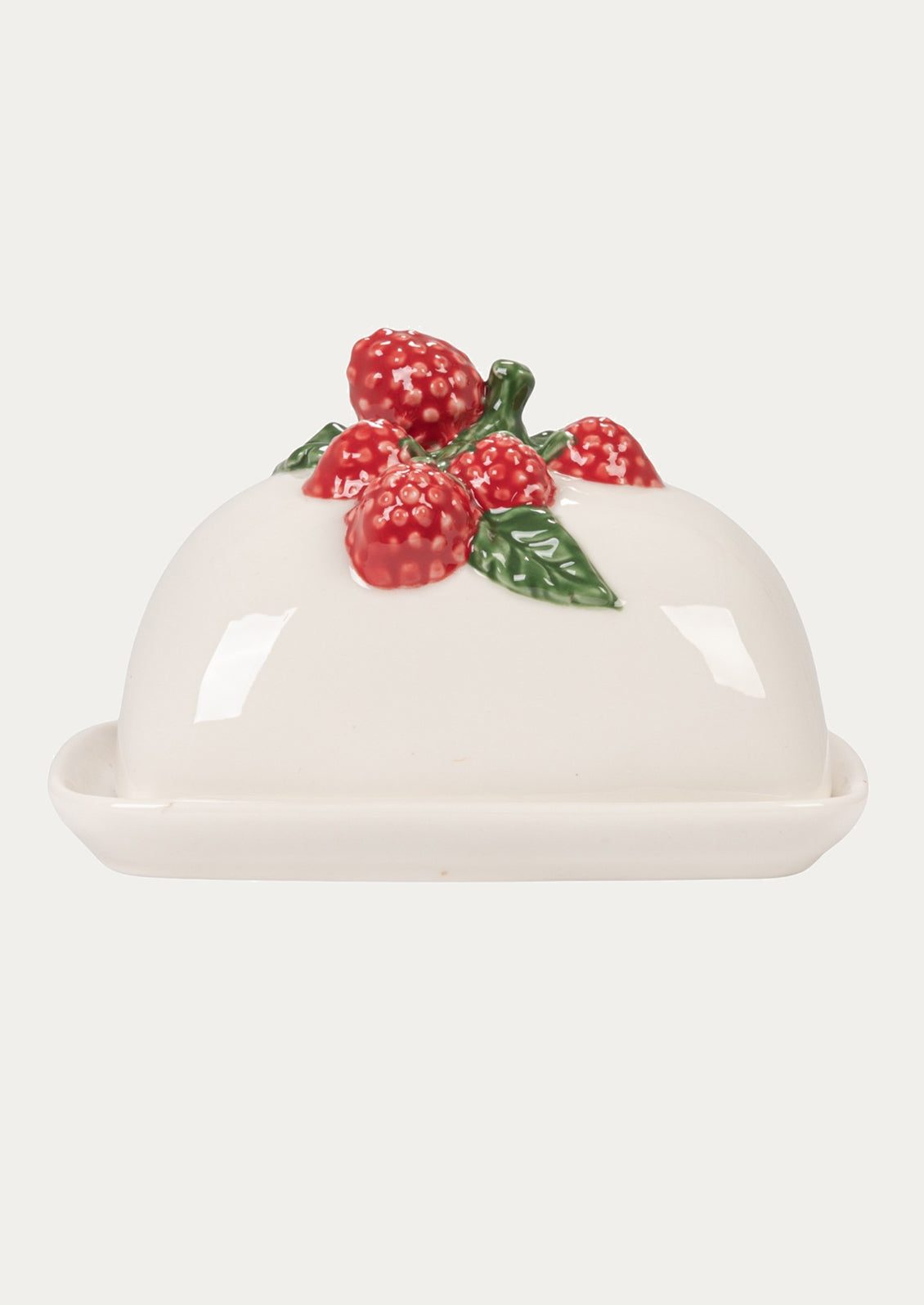 White butter dish with red berry design on a white background