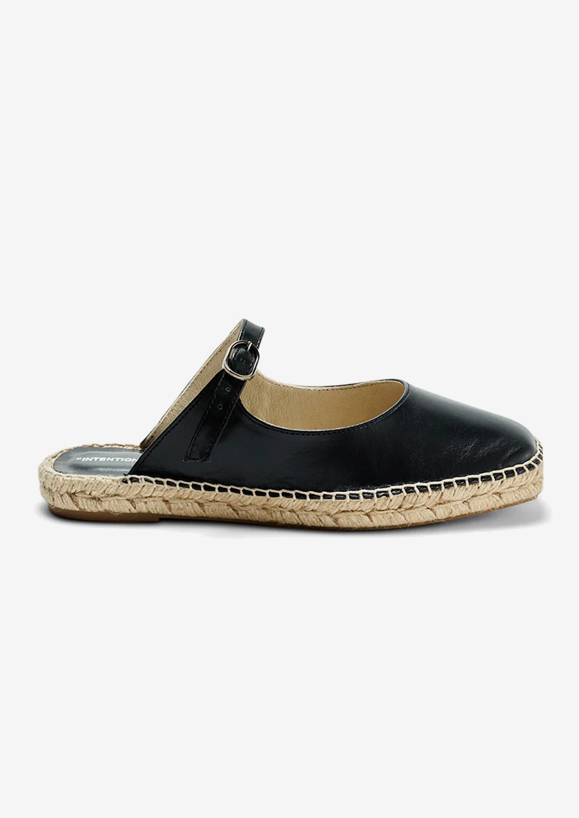 A flat mule slip on with mary jane buckle vamp and jute sole.