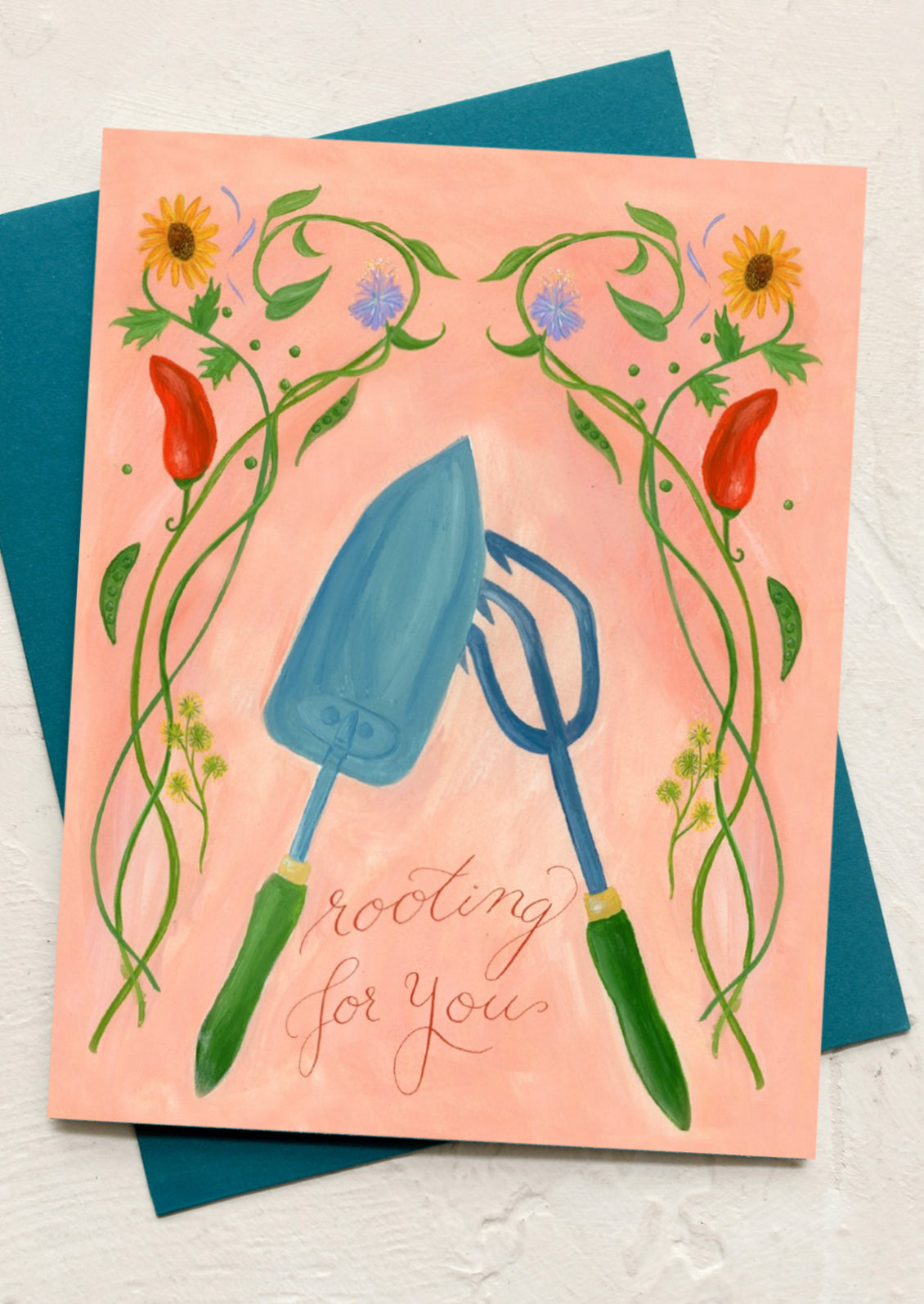 Greeting card with gardening tools and plants on a pink background