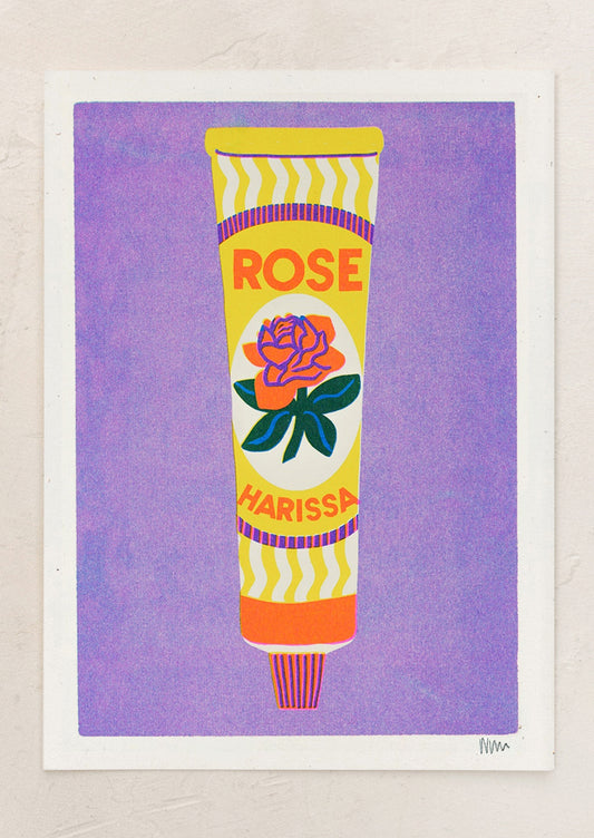 Colorful illustration of a tube labeled 'Rose Harissa' on a purple background.