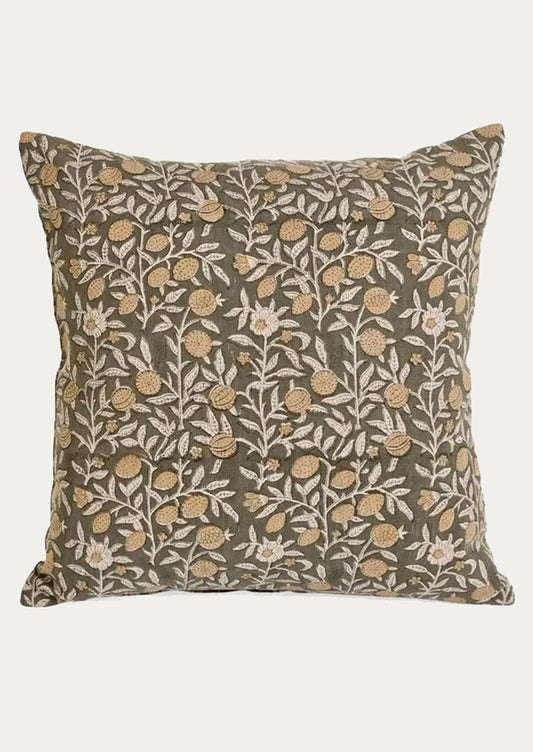 Decorative pillow with floral pattern.