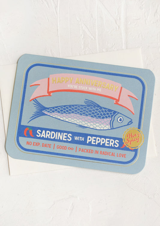 A card that looks like a sardine tin, text reads "Happy anniversary, you're stuck with me".