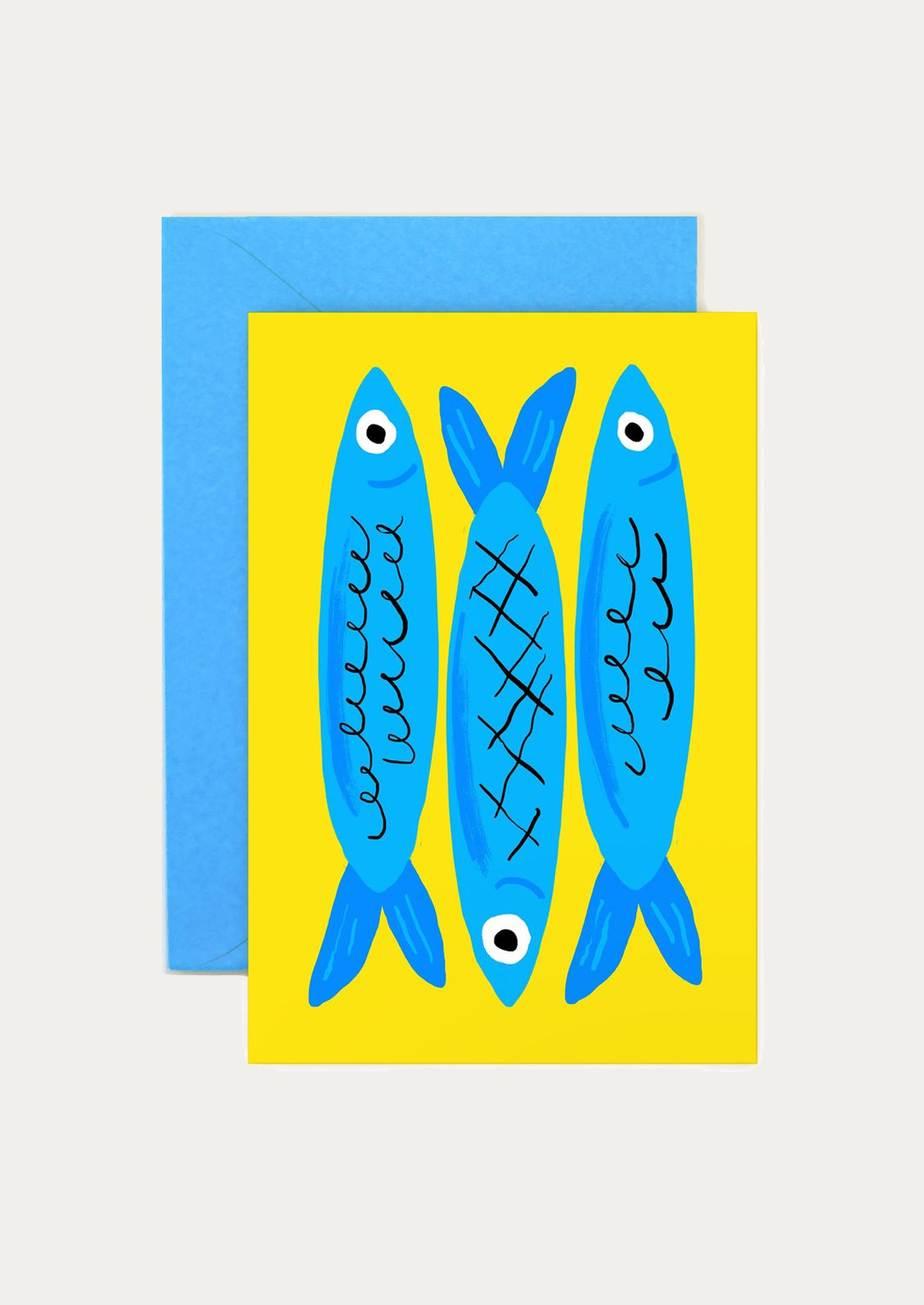 Three blue fish illustrations on a yellow card with a blue envelope.
