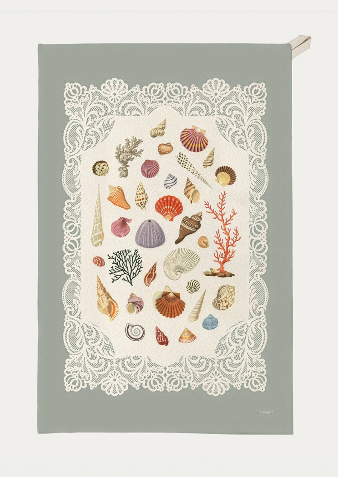 Tea towel with sea-themed design on a light green background