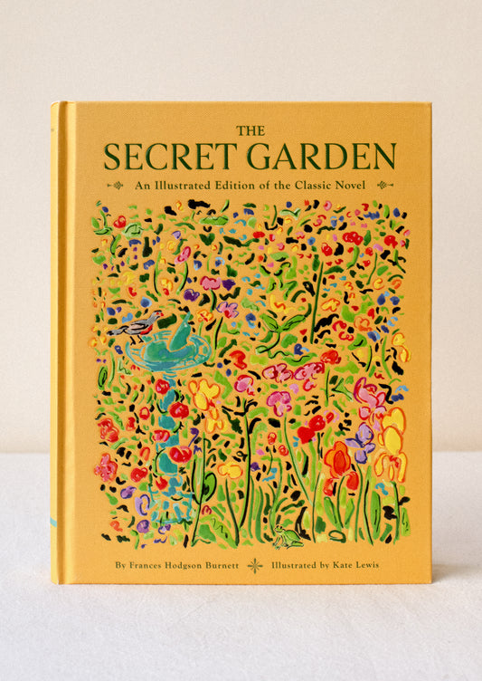 A hardcover book with yellow cover titled "The Secret Garden: An Illustrated Edition Of The Classic Novel".