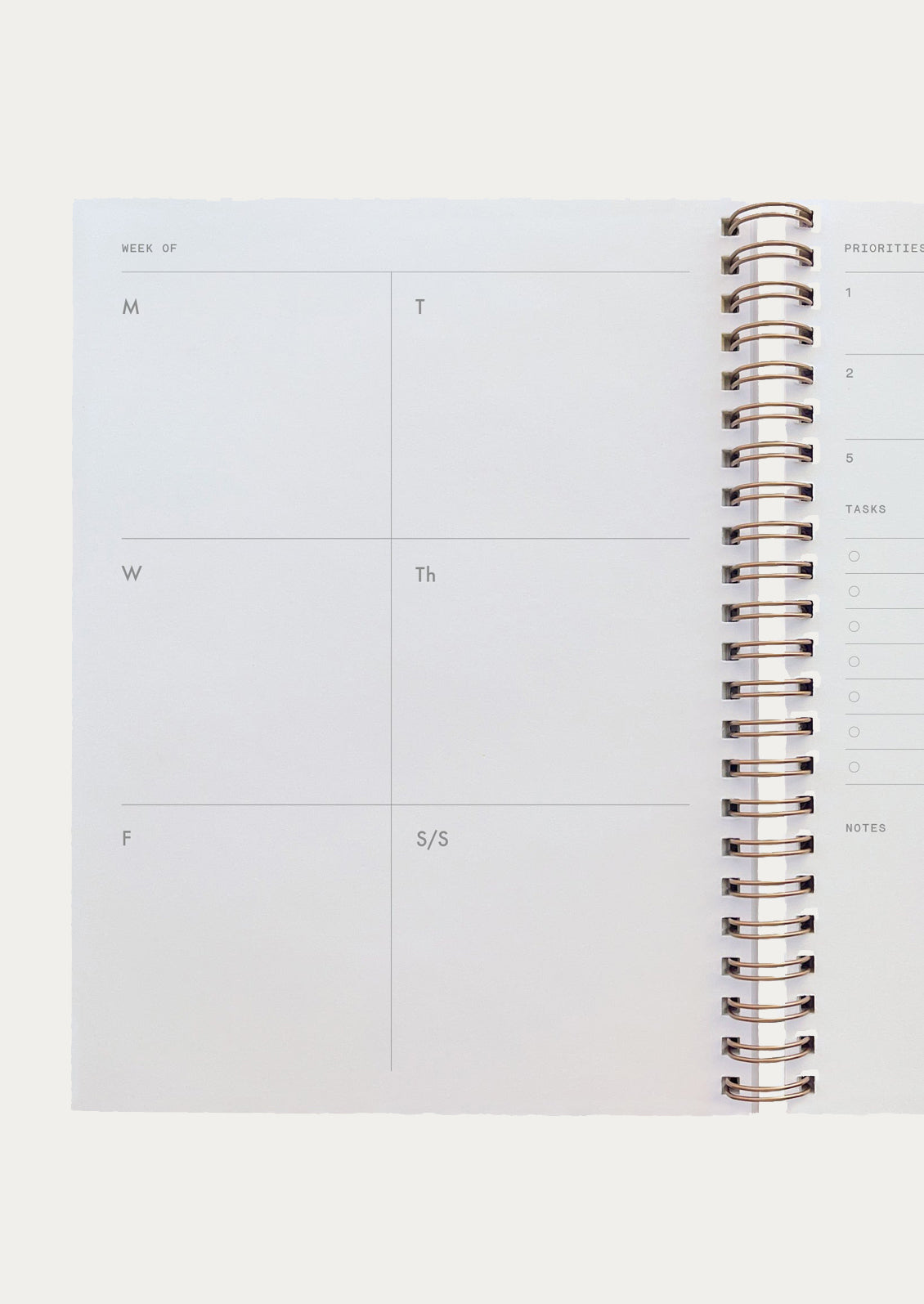 Interior (undated) planner pages for days of the week.
