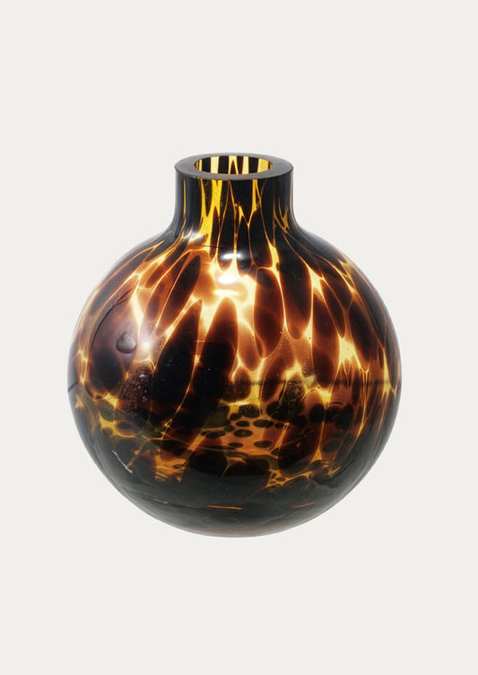 Vase with tortoiseshell pattern on a white background