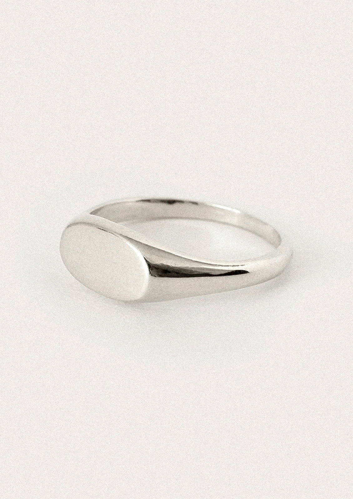 A simple sterling silver signet ring.