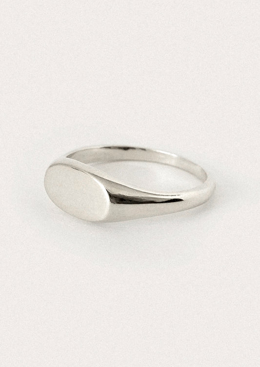 A simple sterling silver signet ring.