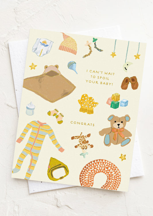 A greeting card illustrated with baby objects, text reads "I Can't wait to spoil your baby! Congrats".