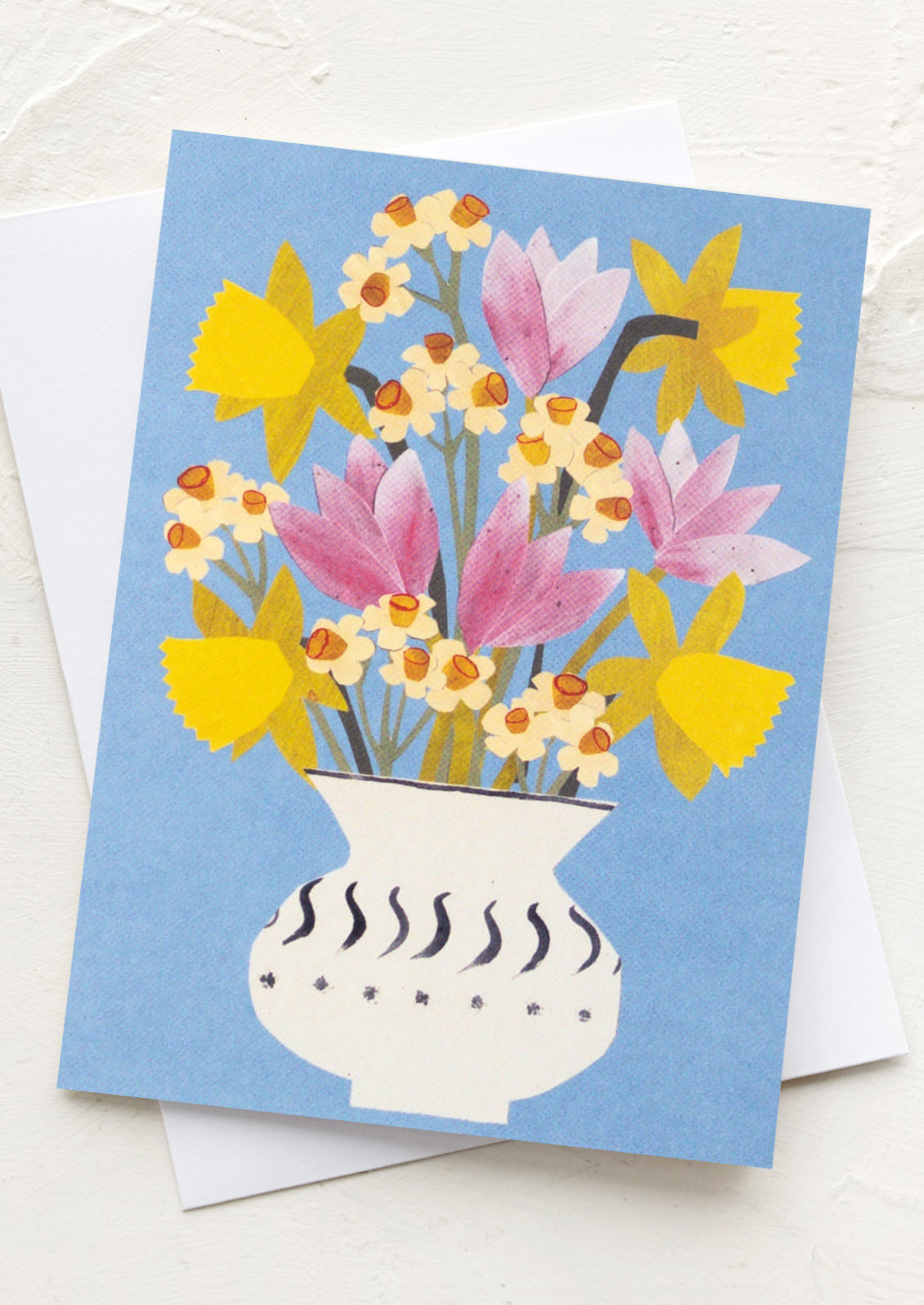 Greeting card with a floral design on a blue background