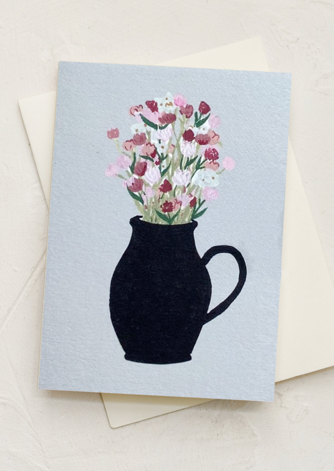 A mini greeting card with illustration of mixed arrangement in black pitcher.