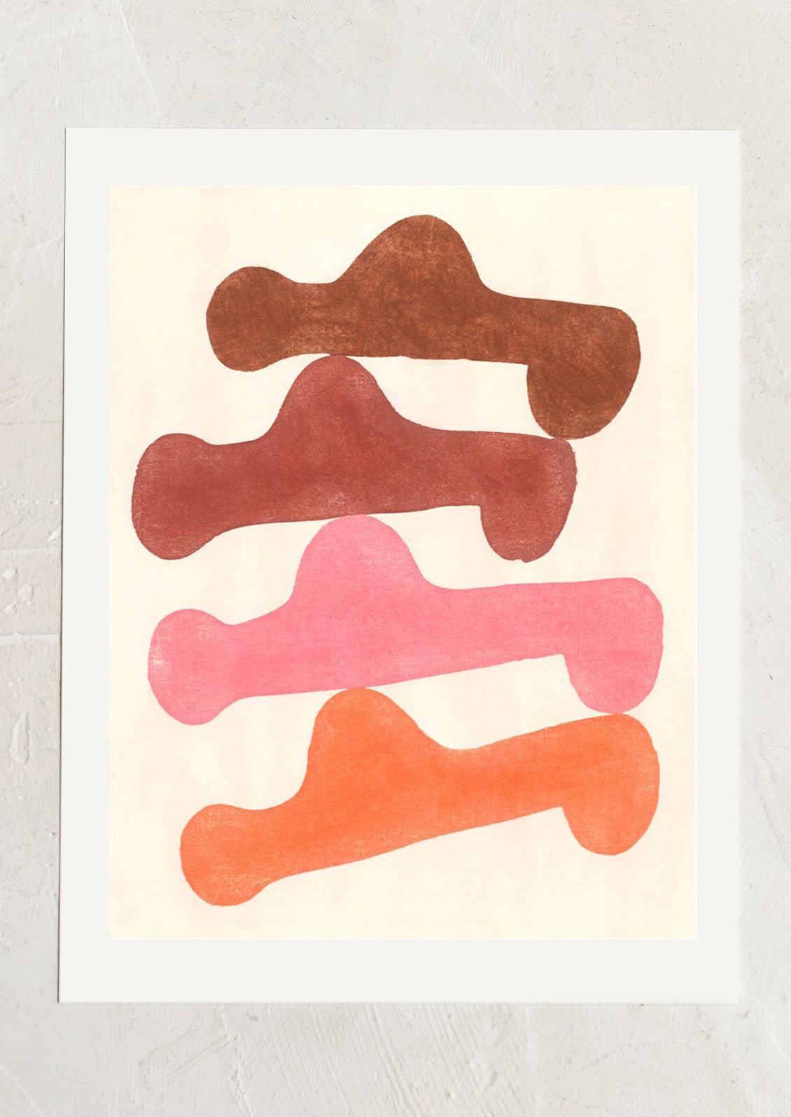 An art print depicting geometric stacked shapes in warm tones.