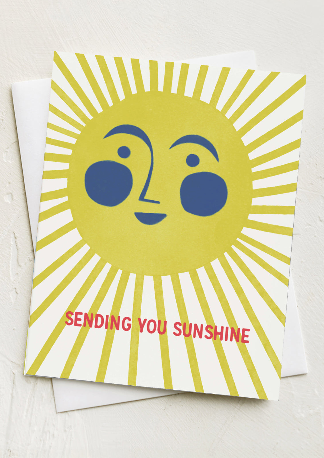 A card with image of smiling sunshine, text reads "Sending you sunshine".