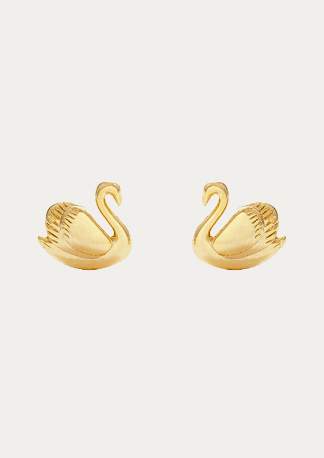 A pair of small gold swan earrings.