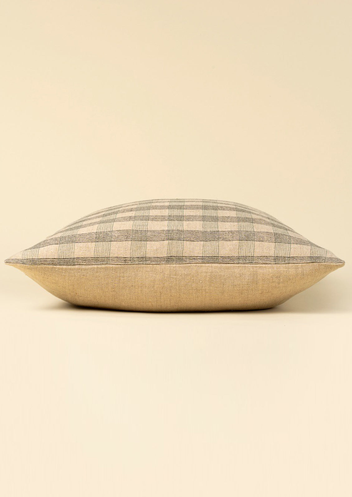Plaid patterned natural linen pillow.