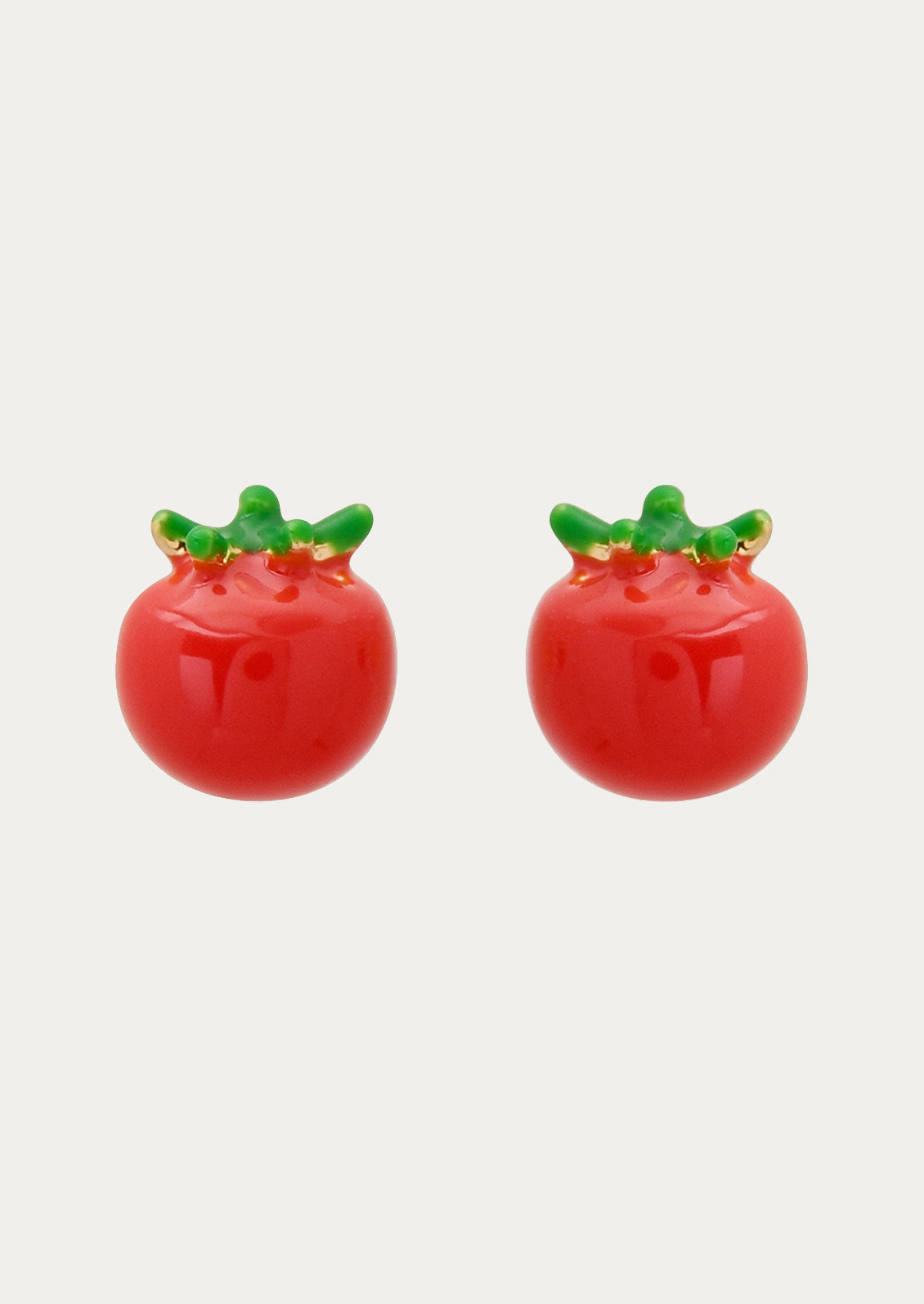 A pair of tomato stud earrings.