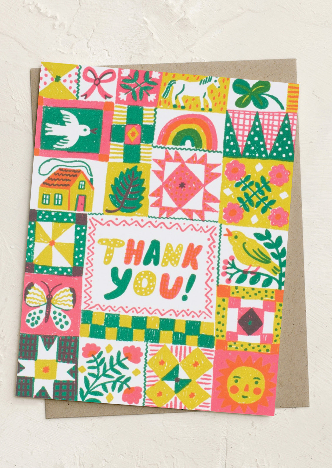 A quilt print card reading "Thank you!" at center.