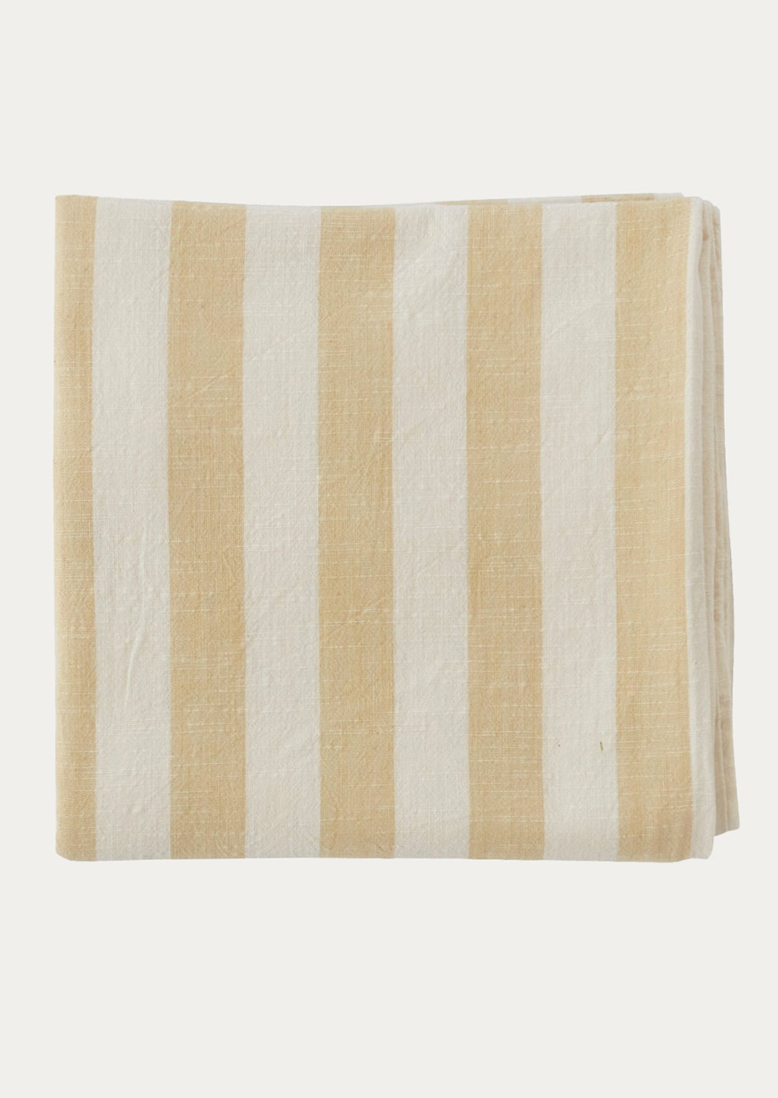 A cotton tablecloth in pale beige and white stripe pattern.