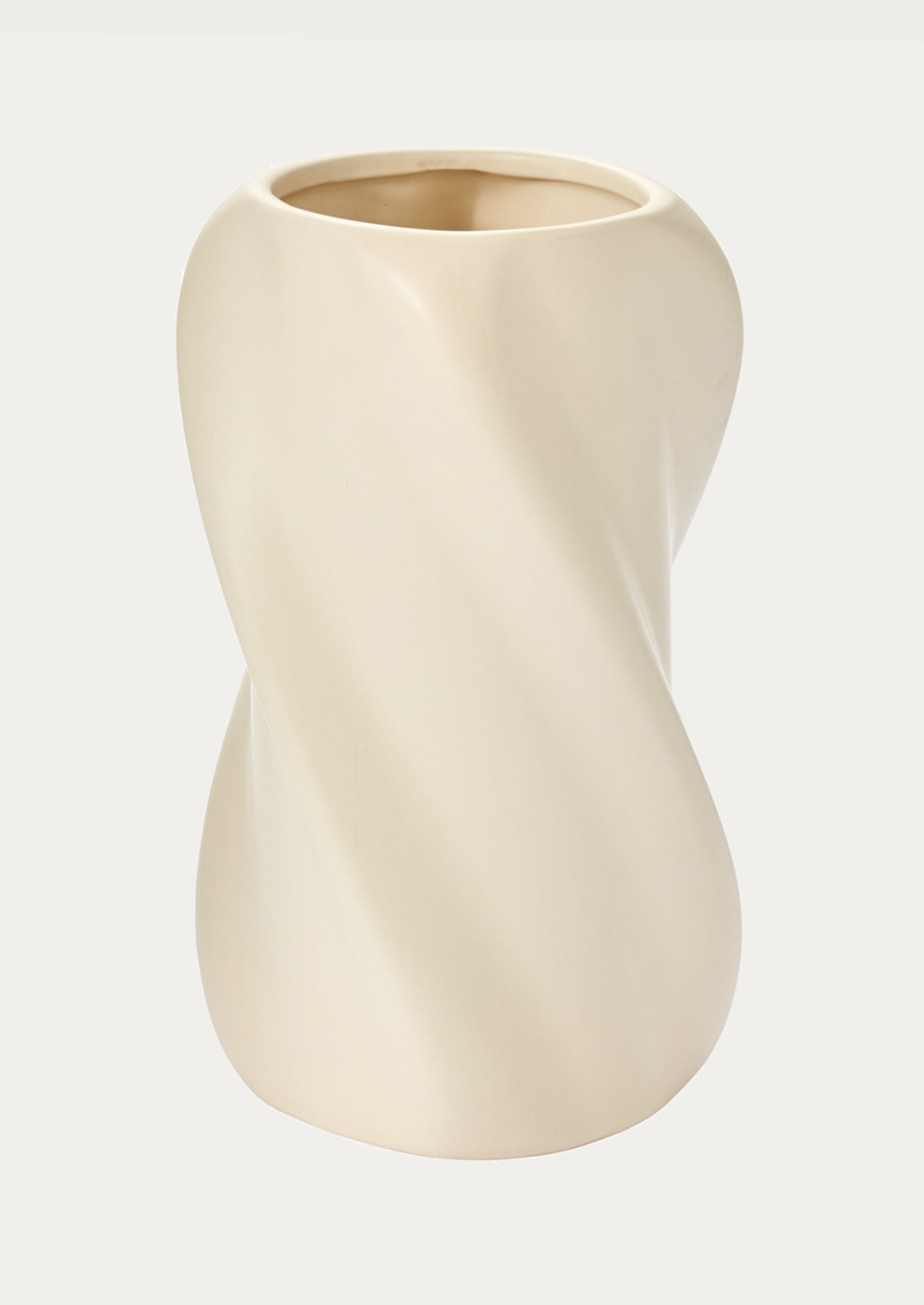 Beige ceramic vase on a light beige background