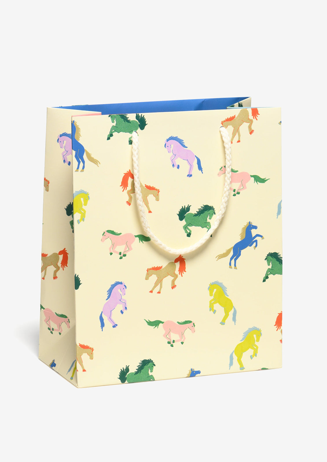 A printed gift bag with colorful horse print on ivory background.