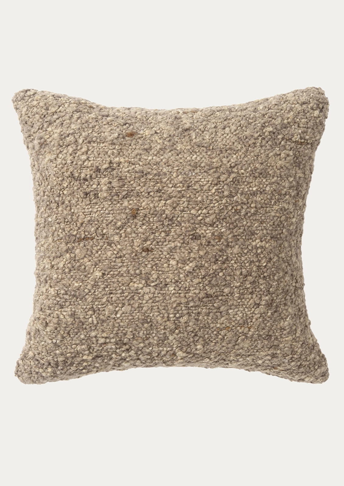 A square throw pillow with a textured, chunky woven boucle fabric in a warm taupe-beige color.