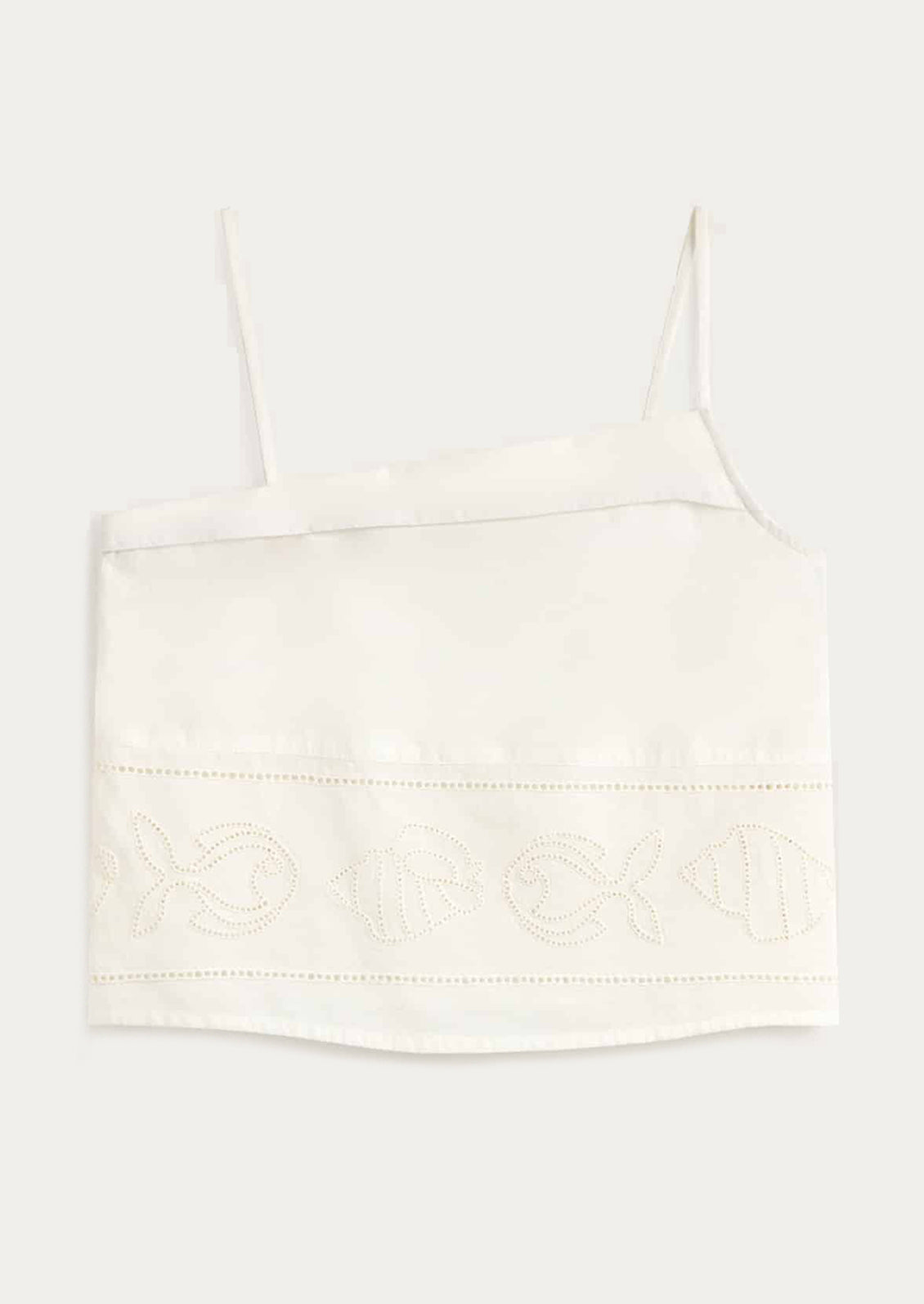 White lace-trimmed top on a light gray background