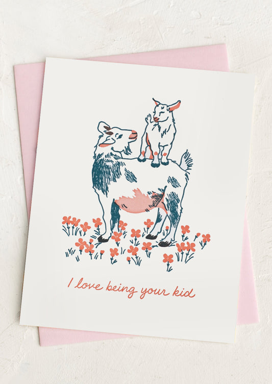 A greeting card with illustration of goats, text reads "I love being your kid".