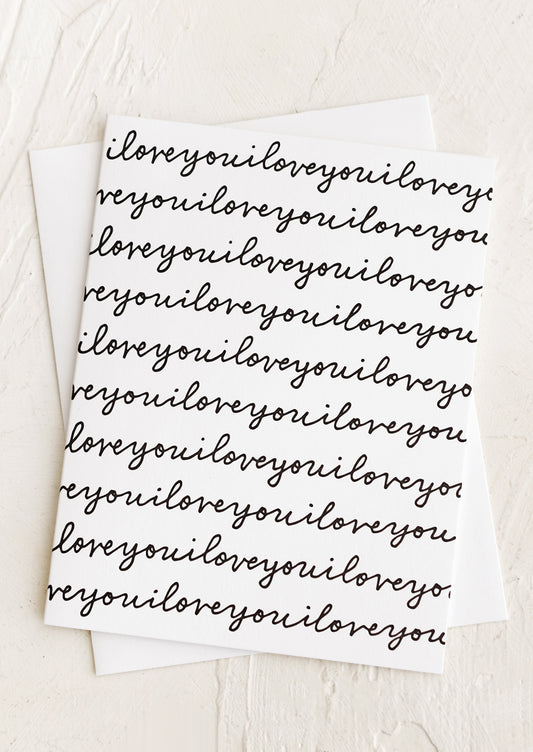 A card reading "I love you" repeating over the whole card.