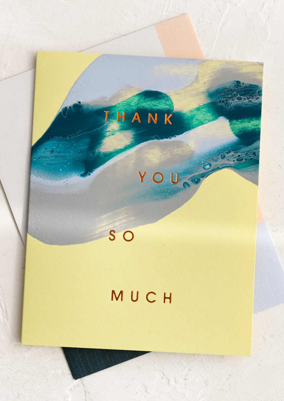 A set of lime green and blue swirl thank you cards.