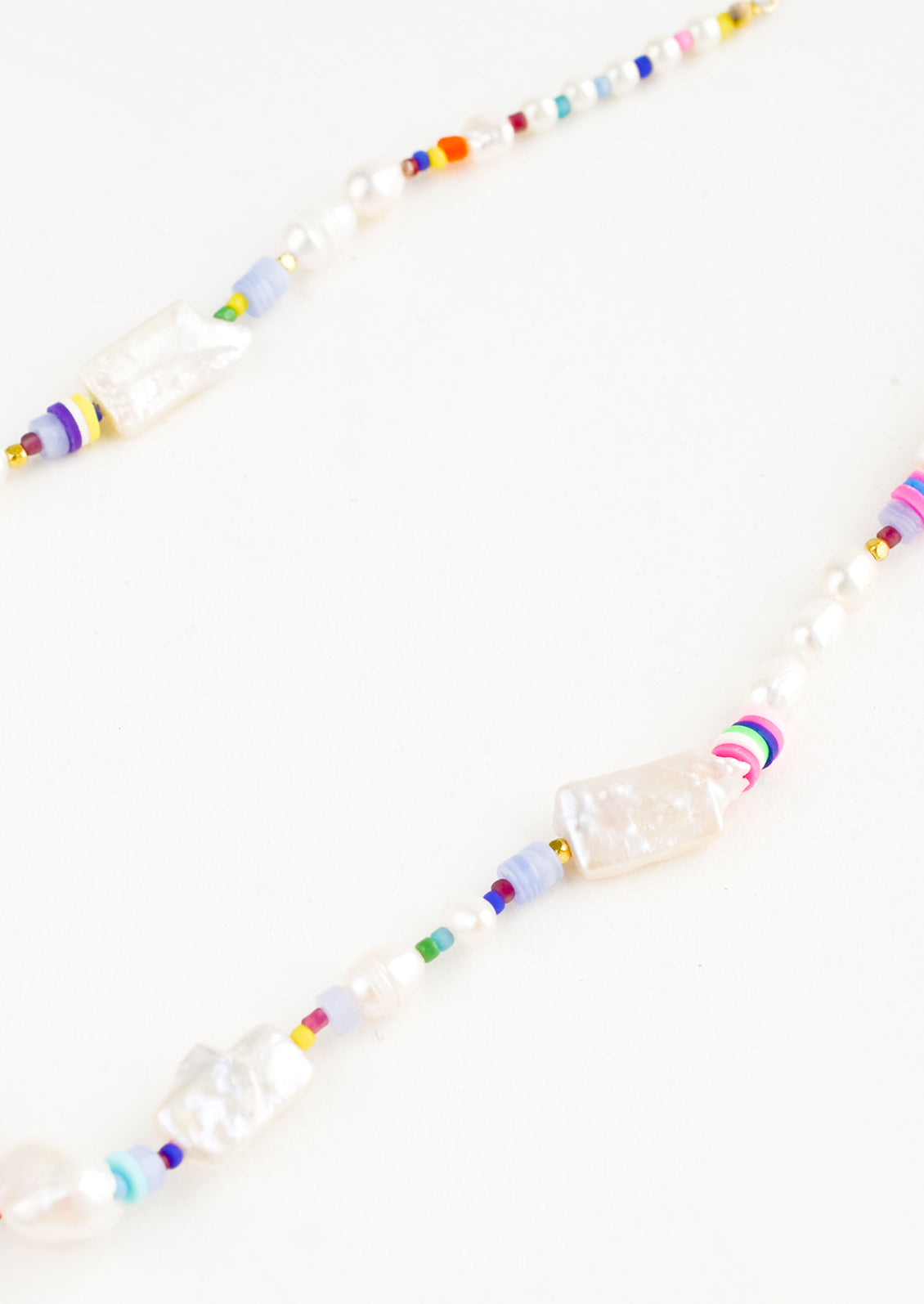Mixture of pearl, heishi and glass seed beads