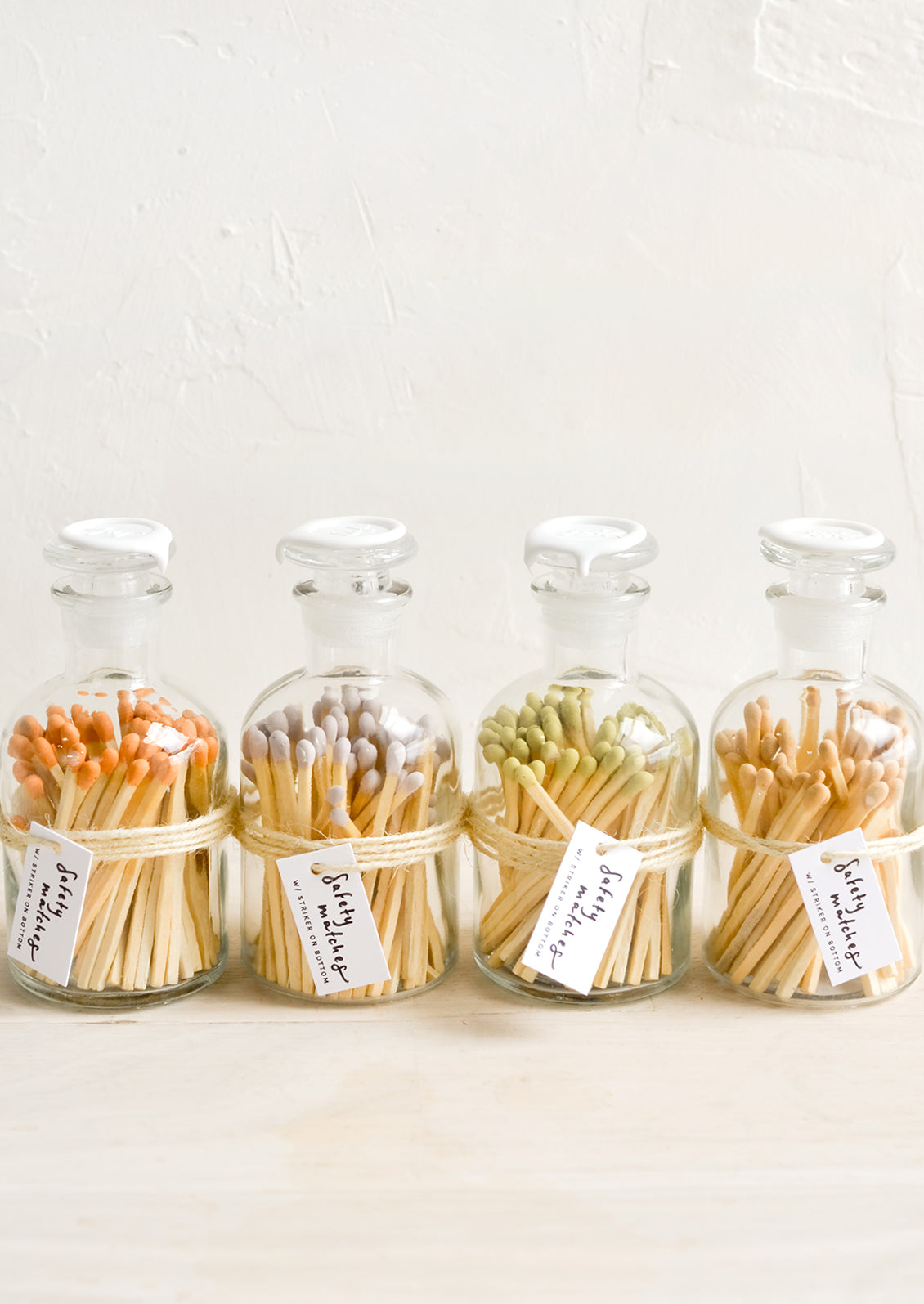 Safety matches in vintage style glass apothecary jars, with four match tip color options.