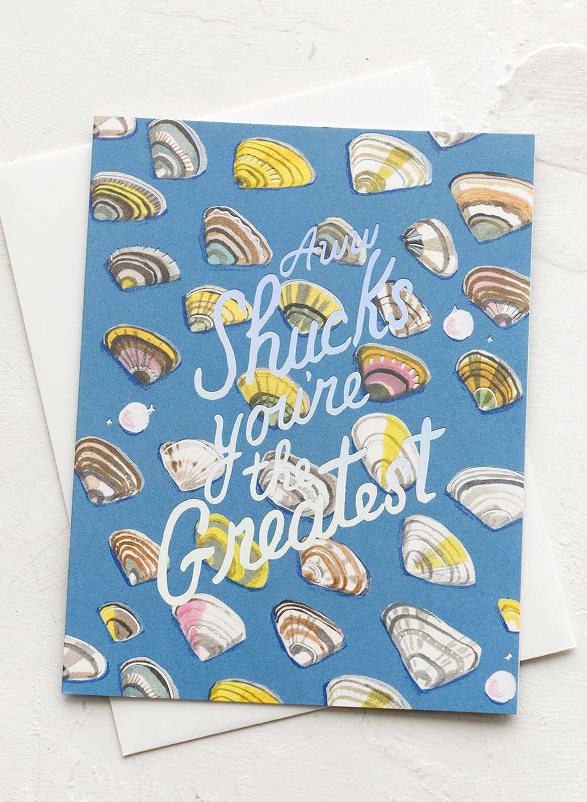 Card with oyster shells reading "Aw shucks you're the greatest".