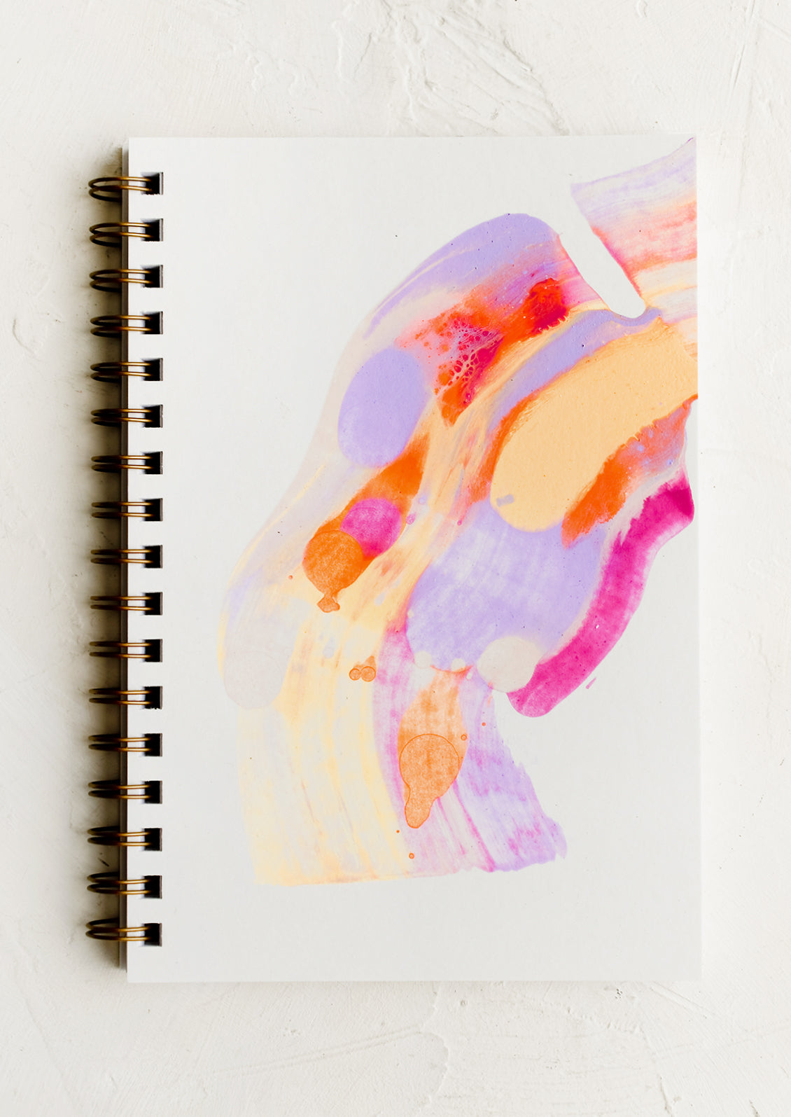 A paint swirl decorated notebook.