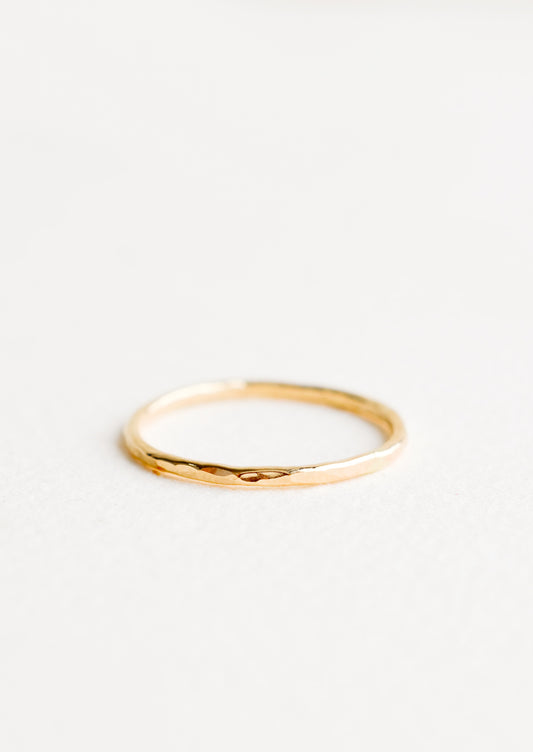 Thin hammered gold ring. 