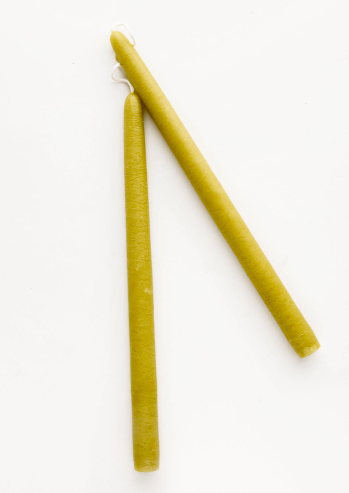 Pair of taper candles in chartreuse.