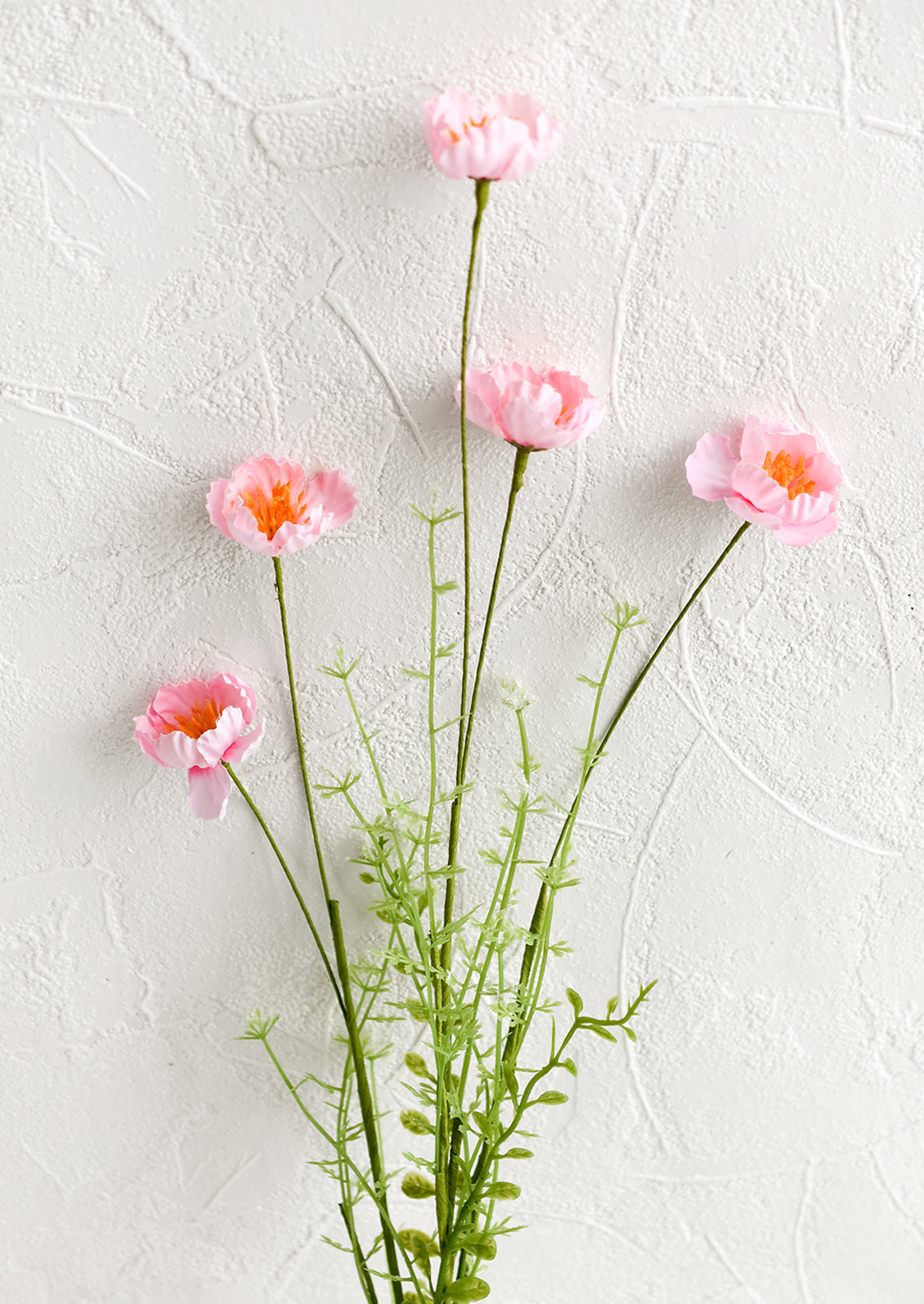 A faux mini poppy spray in pink.
