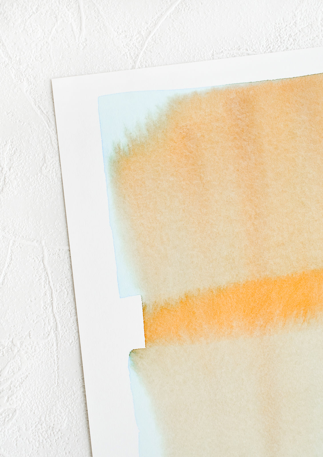 A watercolor form in rust and cyan.