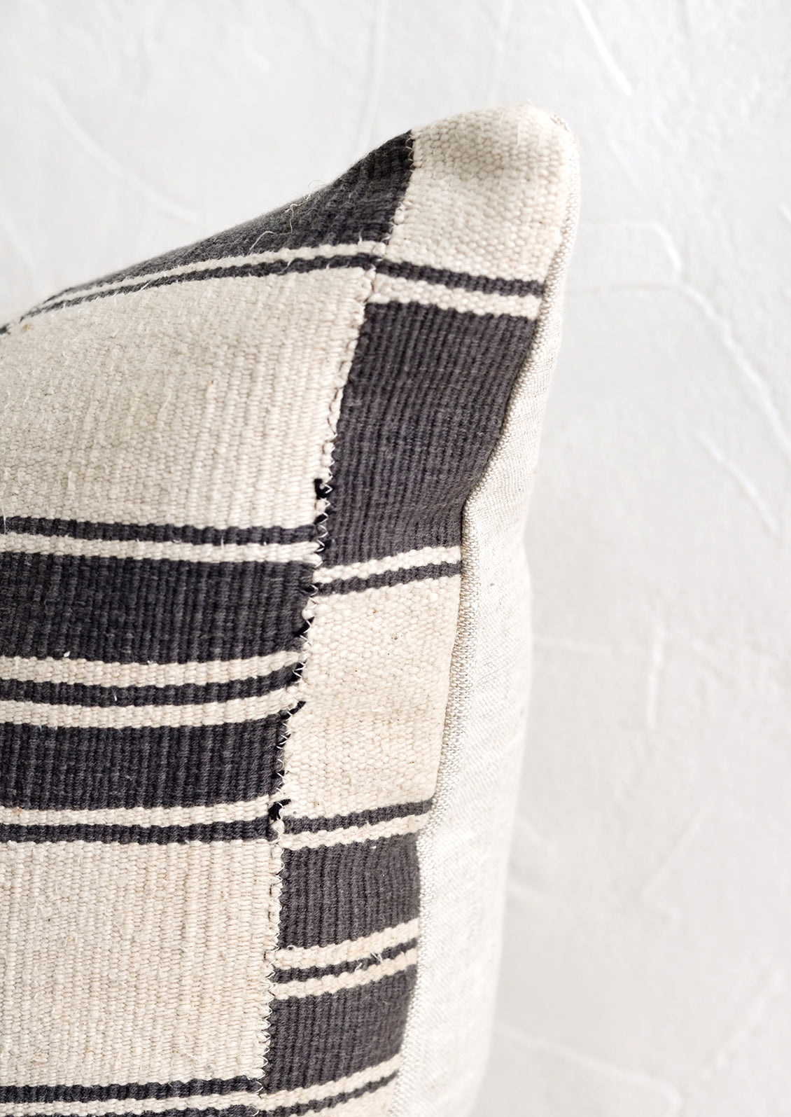 Throw pillows made from vintage African black and white fabric.