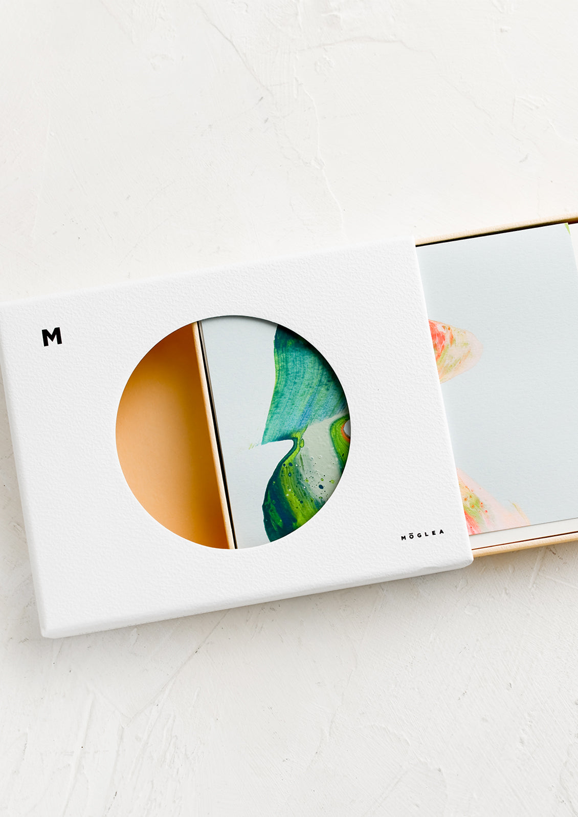 A box of hand painted cards.