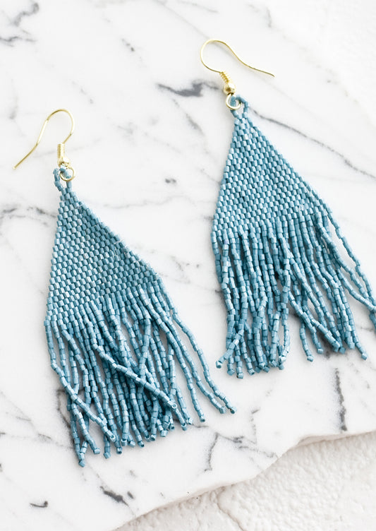 Metallic light blue triangular fringe beaded earrings.